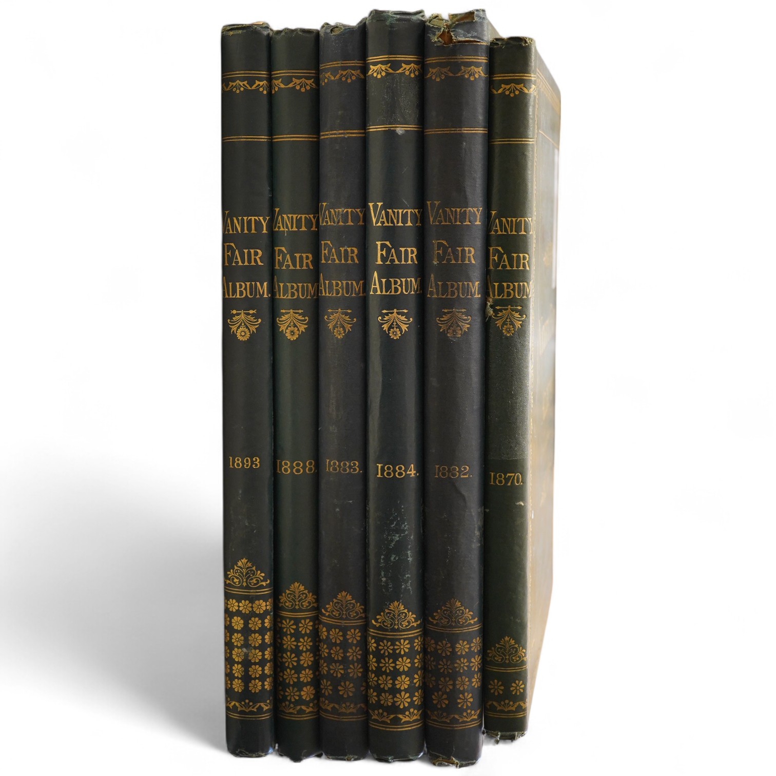 The Vanity Fair Album ... six various vols. (nos.2, 14,15,16,20 and 25). very many coloured lithographed portrait plates; publisher's gilt decorated and lettered cloth, ge., folio. (1869-93)